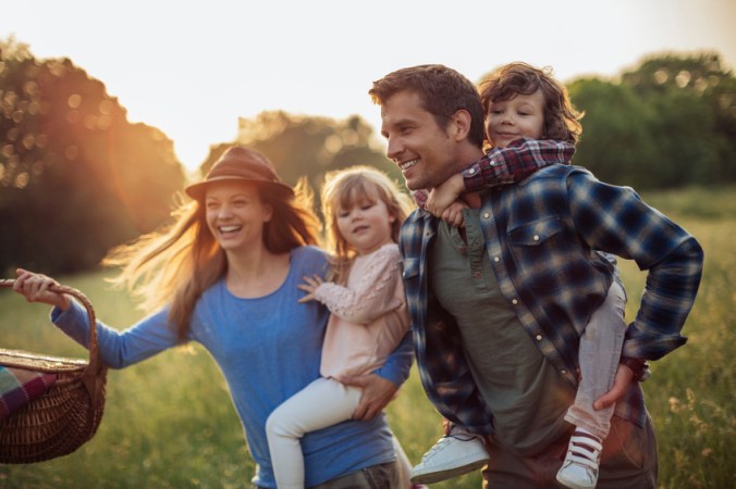 Photo of a happy family going for picnic